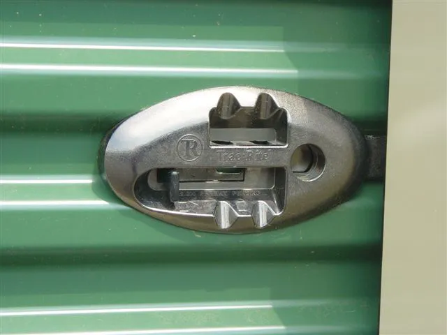 SpaceGuard latch and cylinder lock on storage unit door